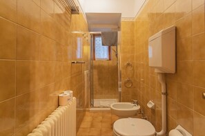 Apartment (1 Bedroom) | Bathroom | Shower, bidet, towels, soap