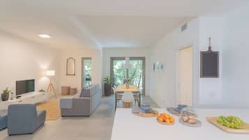 Apartment (Ginepro) | Living area | 32-inch flat-screen TV with cable channels