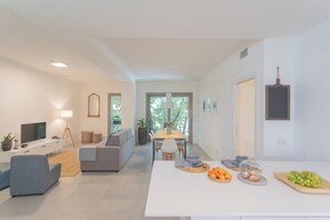Apartment (Ginepro) | Living area | 32-inch flat-screen TV with cable channels