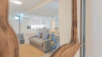 Apartment (Ginepro) | Living area | 32-inch flat-screen TV with cable channels