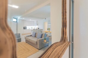 Apartment (Ginepro) | Living area | 32-inch flat-screen TV with cable channels - Salvia & Ginepro Apartments by Rent all Como (Como)