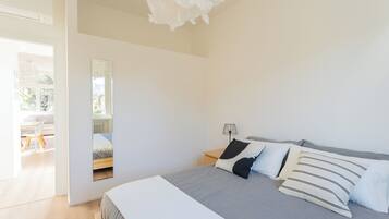 Apartment, 1 Bedroom (Sunny Corner near Bellagio) | 1 bedroom, iron/ironing board, cribs/infant beds, free WiFi