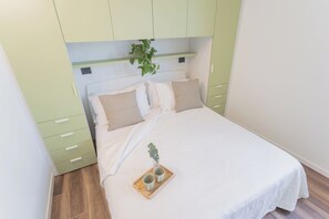 Apartment (1 Bedroom) | 1 bedroom, iron/ironing board, bed sheets - Misultin House & Swimming Pool by Rent all Como (Pianello del Lario)