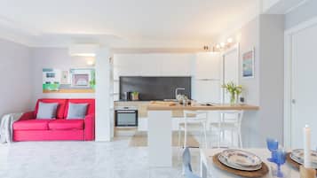 Apartment (1 Bedroom) | Living area | 32-inch Smart TV with satellite channels