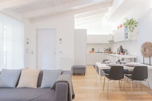 Apartment (2 Bedrooms) | Living area | 32-inch flat-screen TV with cable channels