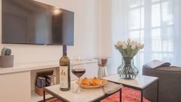 Apartment (2 Bedrooms) | Living area | 32-inch flat-screen TV with cable channels
