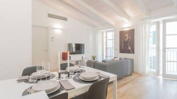 Apartment (2 Bedrooms) | Living area | 32-inch flat-screen TV with cable channels