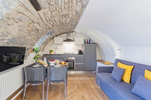 Apartment (3 Bedrooms) | Living area | 32-inch Smart TV with cable channels, TV