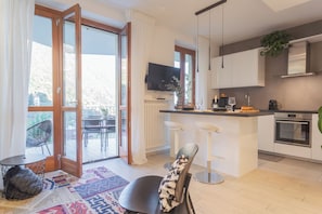 Apartment (1 Bedroom) | Private kitchen | Oven, espresso maker, electric kettle, high chair