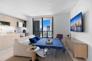 2 habitaciones, tabla de planchar con plancha, cuna de viaje y wifi 