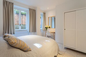 Apartment, 2 Bedrooms (2 Bedrooms) | 2 bedrooms, laptop workspace, iron/ironing board, bed sheets