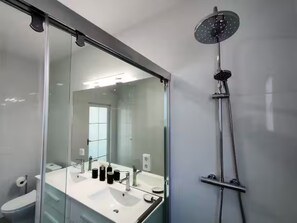 Shower, hair dryer, towels, soap