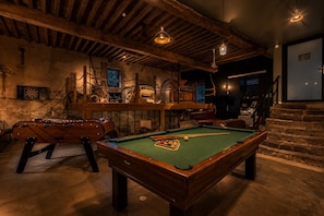 A billiards room with a pool table, a foosball table, and a dartboard. - Renovated, spacious and comfortable 26-bed mill (Saint-Ignat)