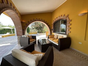 Furniture, Wall, Interior Design, Flooring, Couch, Floor, Lighting, Table, Ceiling, Chair