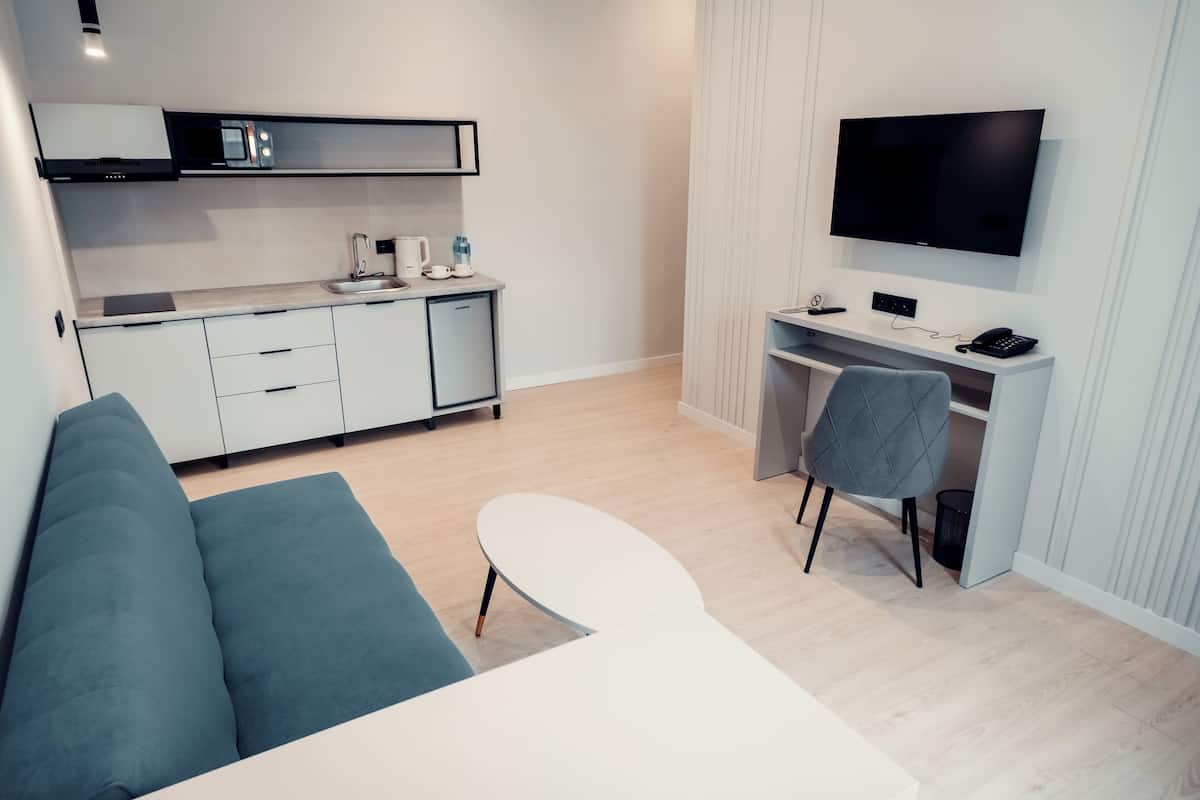 Deluxe Apartment | 1 bilik tidur, peti besi dalam bilik, meja, langsir/tirai gelap terus