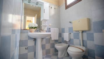 Classic Triple Room | Bathroom | Shower, rainfall showerhead, hair dryer, slippers