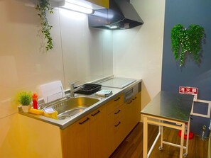 Fridge, microwave, cookware/dishes/utensils