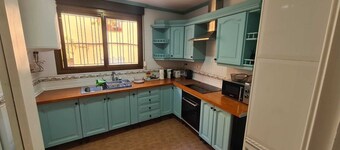 Town House with roof terrace and stunning views. Close to all local amenities