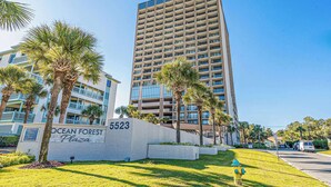 A tall building with a sign reading "Ocean Forest Plaza" and the number "5523". - Ocean Forest Plaza 708 - Oceanfront (Myrtle Beach)