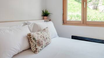 Deluxe Apartment, Garden View | 2 bedrooms, down duvets, iron/ironing board, bed sheets