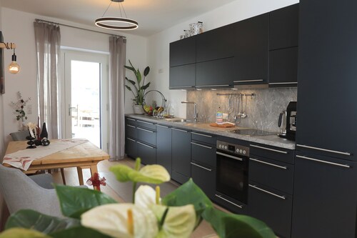 Appartement Valerie verzaubert mit modernen Design und harmonischer Farbauswahl.