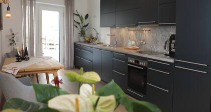 Appartement Valerie verzaubert mit modernen Design und harmonischer Farbauswahl.