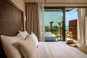 In-room safe, desk, laptop workspace, blackout curtains - Nalu Resort & Spa (Rethymno)