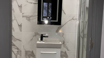 Shower, hair dryer, soap, shampoo