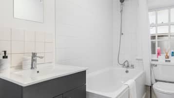 Hair dryer, towels, soap, toilet paper