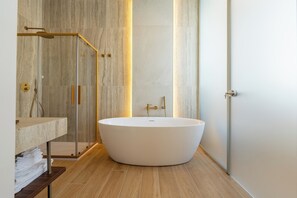 Junior Studio Suite | Bathroom | Hair dryer, slippers, towels, soap - Puro by Unico Relais (Naples)
