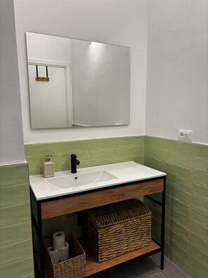 Hair dryer, towels, soap, toilet paper