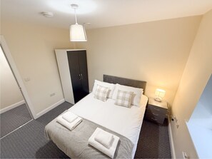 Appartement Exécutif, salle de bains attenante | Fer et planche à repasser, Wi-Fi gratuit