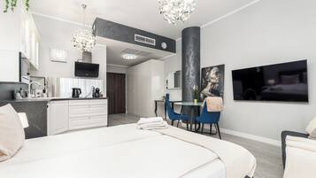 Deluxe Apartment, Balcony, City View | 1 bedroom, iron/ironing board, cots/infant beds, bed sheets