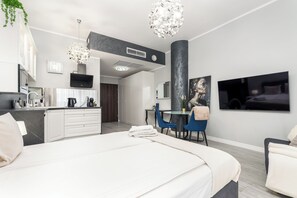 Deluxe Apartment, Balcony, City View | 1 bedroom, iron/ironing board, cribs/infant beds, bed sheets - MARGI Elva Apartment (Szczecin)