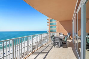 A balcony with a view of the beach and ocean. - Phoenix Gulf Towers 1508 4 Bedroom Condo (Orange Beach)