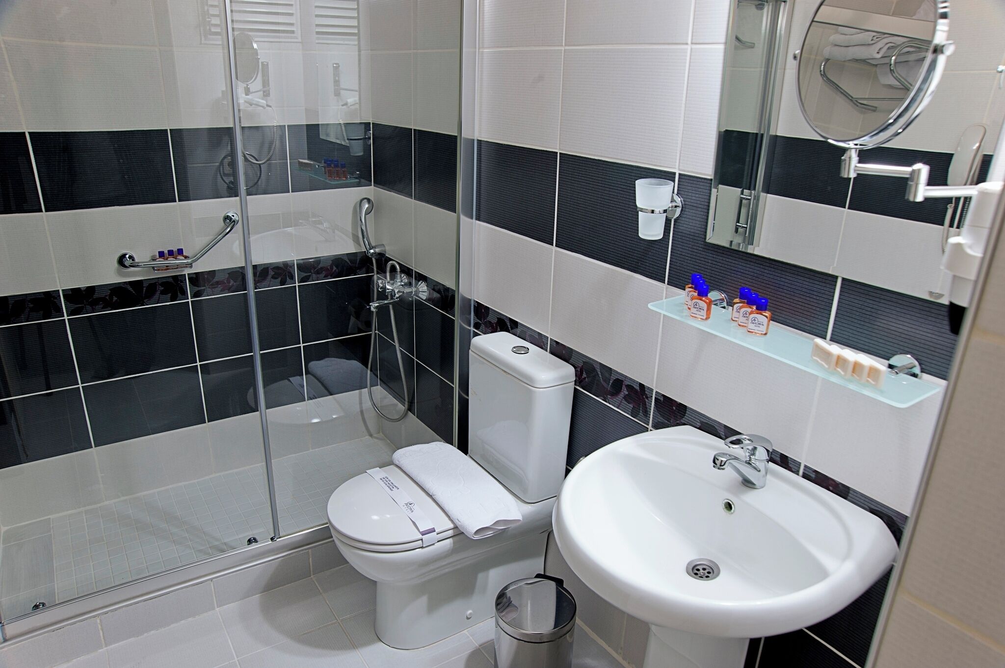 Shower, hair dryer, slippers, towels