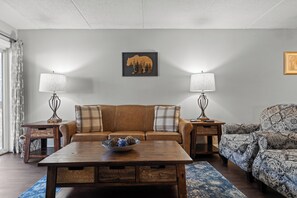 Signature Condo, 2 Bedrooms, Fireplace, Mountainside | Living room | 49-inch Smart TV with cable channels, fireplace