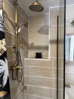 Shower, hair dryer, towels, soap
