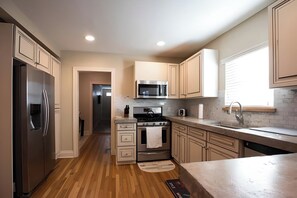 Fridge, microwave, oven, stovetop - Retro Modern Montrose Home - Downstairs Duplex (Houston)