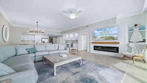 TV, fireplace - Newest Beachfront Complex!!  Parking Level Condo!! (Orange Beach)