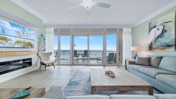 TV, fireplace - Newest Beachfront Complex!!  Parking Level Condo!! (Orange Beach)