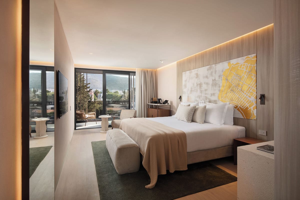 Superior Double or Twin Room | Minibar, in-room safe, desk, blackout drapes