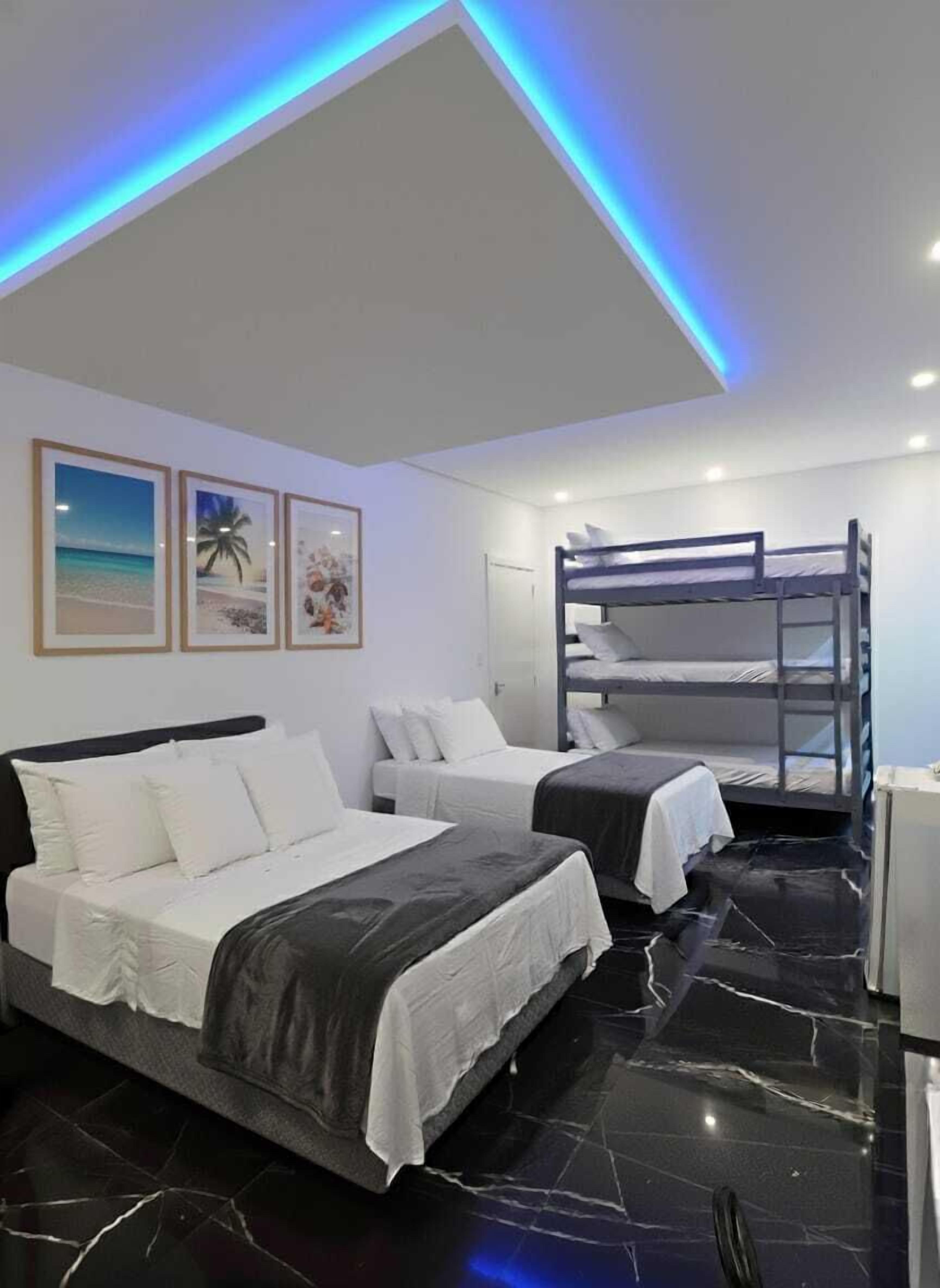 Deluxe Room | Desk, laptop workspace, blackout curtains, free WiFi