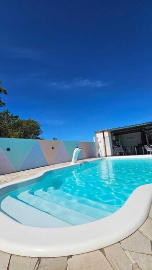 Outdoor pool, open 8:00 AM to 10:00 PM, sun loungers