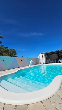 Outdoor pool, open 8:00 AM to 10:00 PM, sun loungers