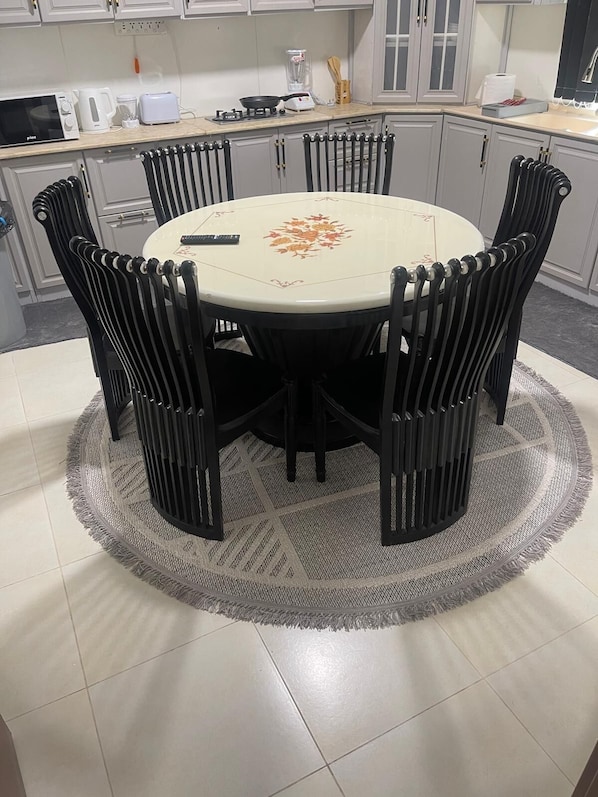 Dining - Spacious 6-bedroom apartment in delightful Madinah with WiFi, AC (Unknown)