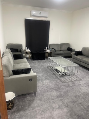 TV - Spacious 6-bedroom apartment in delightful Madinah with WiFi, AC (Unknown)