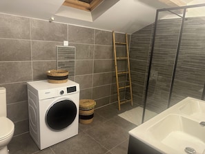 Shower, hair dryer, towels, soap