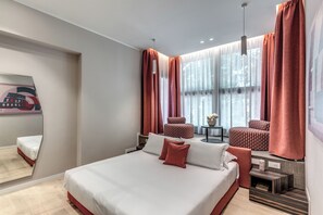 Studio suite | Luxe beddengoed, donsdekens, een minibar, een kluis op de kamer