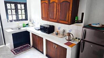 Fridge, microwave, electric kettle, toaster